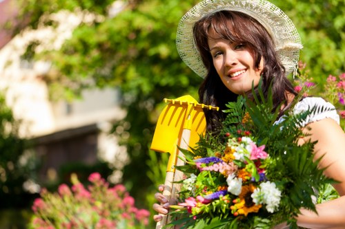 Seasonal planting and evergreen borders in a Kilburn garden